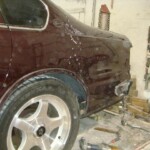 Before and after photographs of a damaged Chevy Impala that was repaired by Elite Paint & Body Shop in West Palm Beach, Florida.